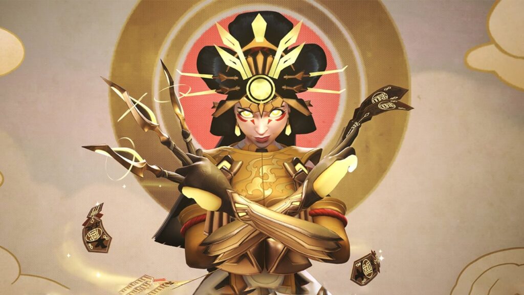 Kiriko in her Amaterasu skin from Overwatch 2, wearing an ornate gold and black outfit with glowing eyes, a radiant sun-like headdress, and mystical paper charms floating around her in a stylized celestial background.