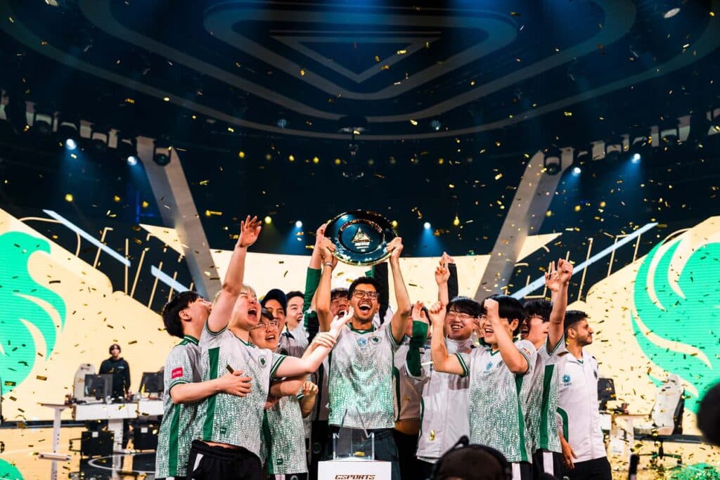 Image of Team Falcons Overwatch 2 roster lifting Esports World Cup trophy